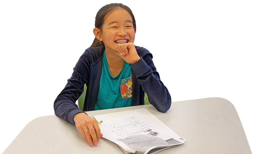 Smiling student at desk