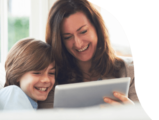 Mom and daughter looking a laptop smiling and surprised