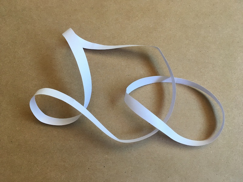 Two interlocking strips of paper