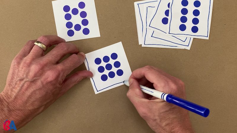Drawing a blue outline around the outside of the dot cards