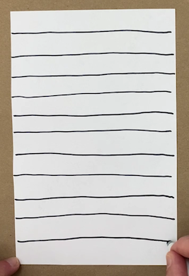 A paper split into twelve equal rows