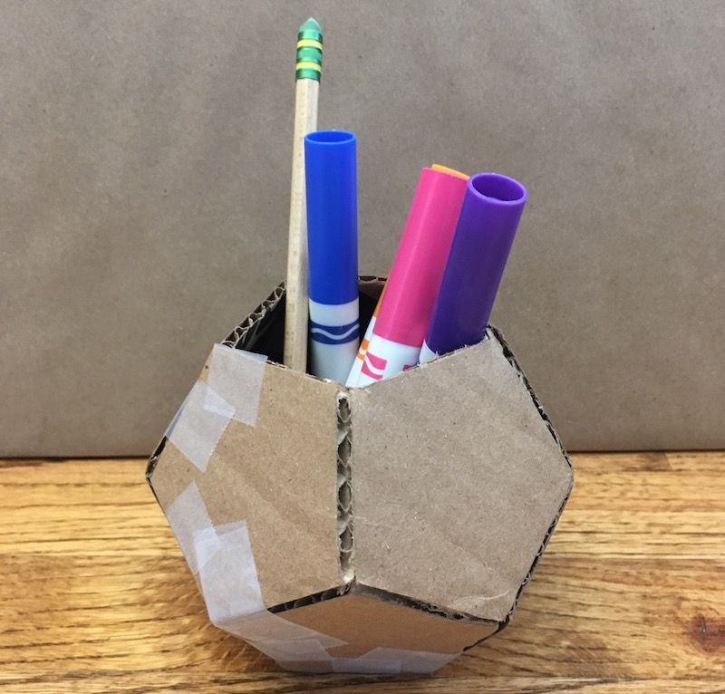 Pencil cup made of a cardboard dodecahedron