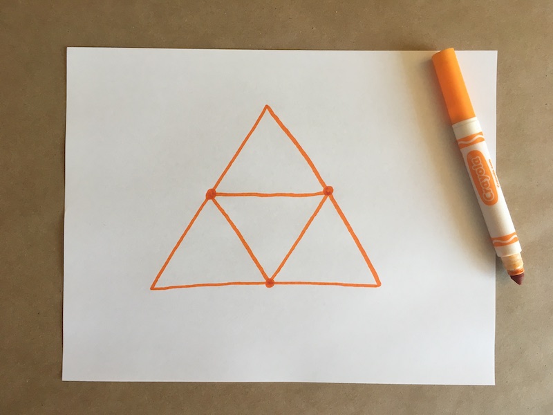 Triangles drawn on a piece of paper